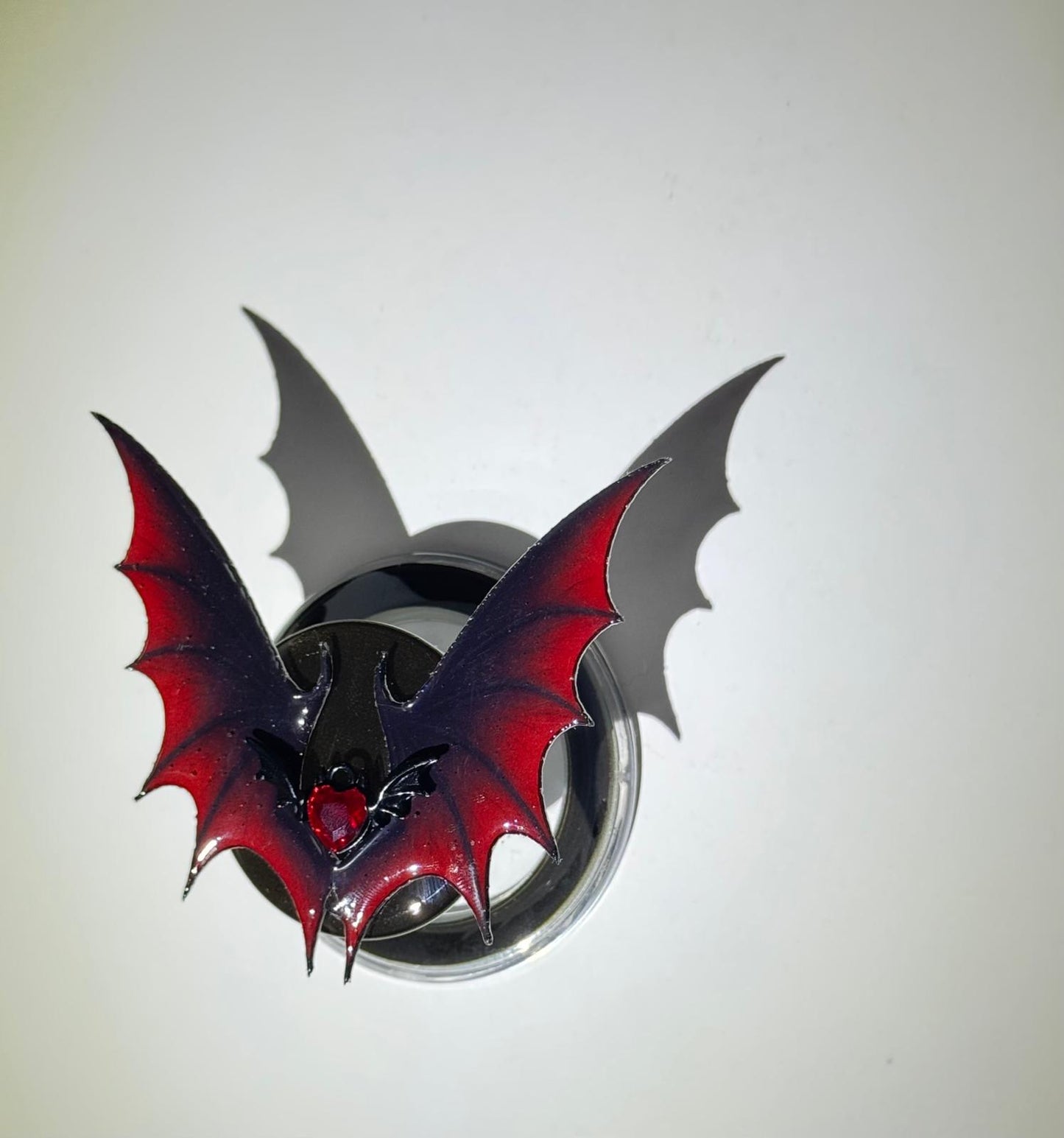 Crimson Bat Wing-Magnetic Grip Kindle & E-Reader Holder